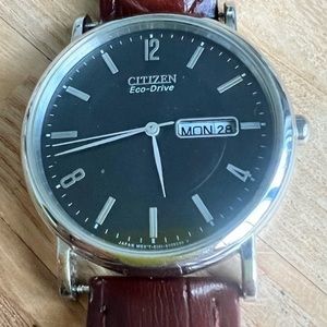 Citizen eco-drive black dial silver tone brown leather dress watch